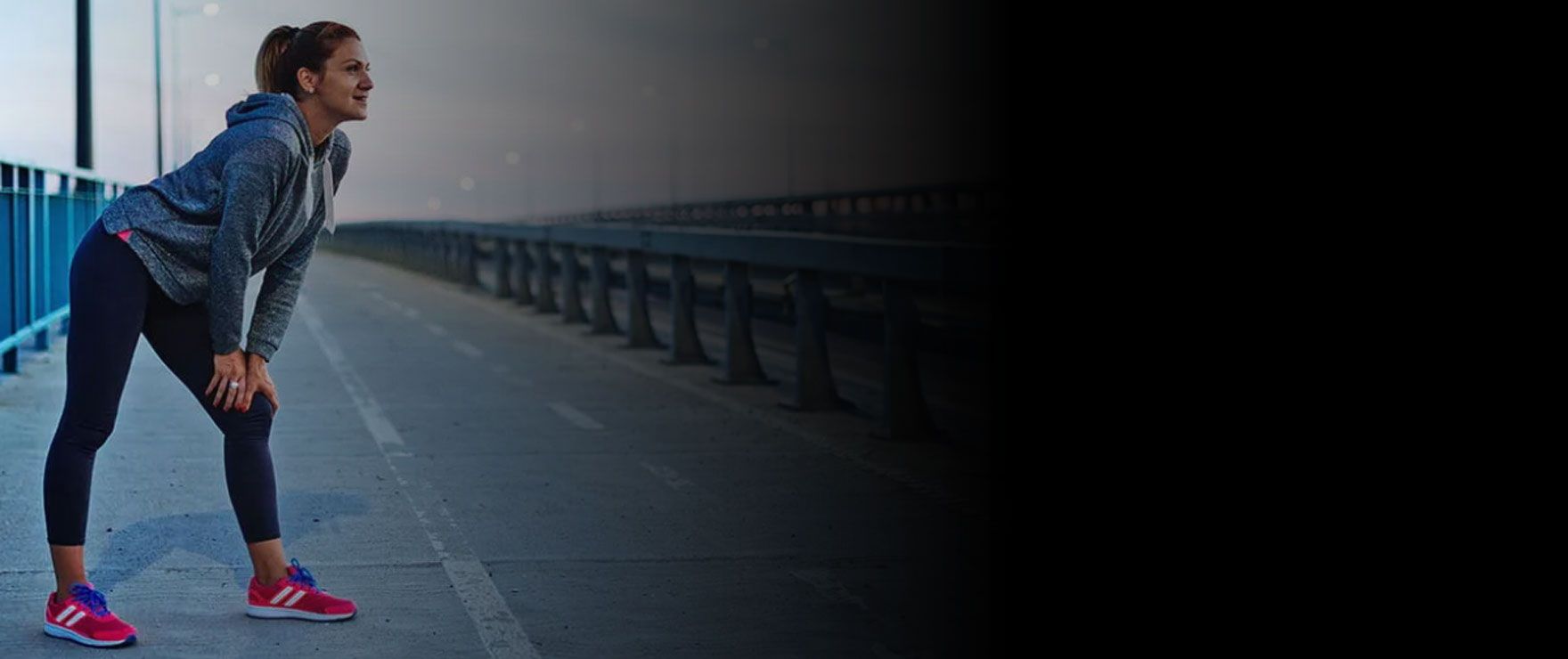 Runner on a bridge