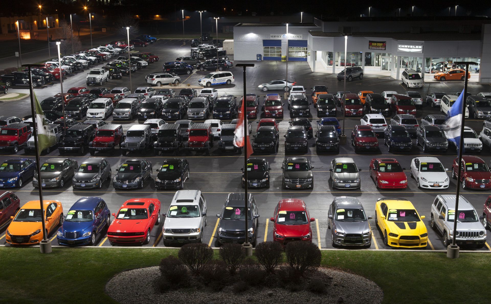 aerial view of cars at a dealership