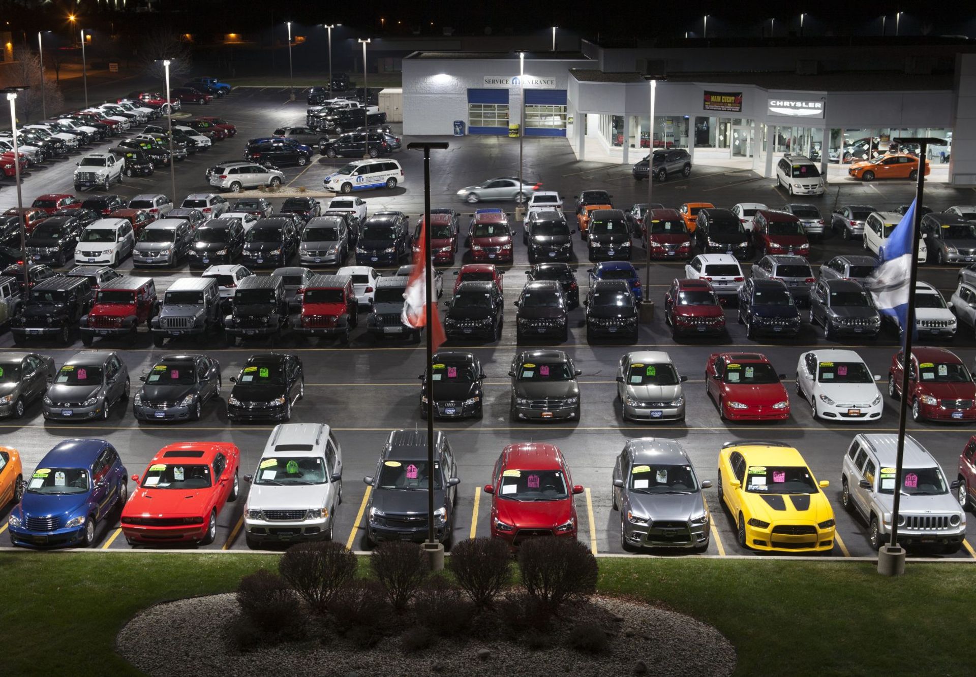 aerial view of cars at a dealership